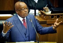 President Jacob Zuma gestures as he addresses parliament in Cape Town